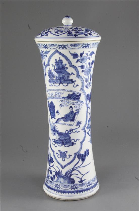 A tall Chinese blue and white waisted cylindrical jar and cover, Kangxi period, height 38cm